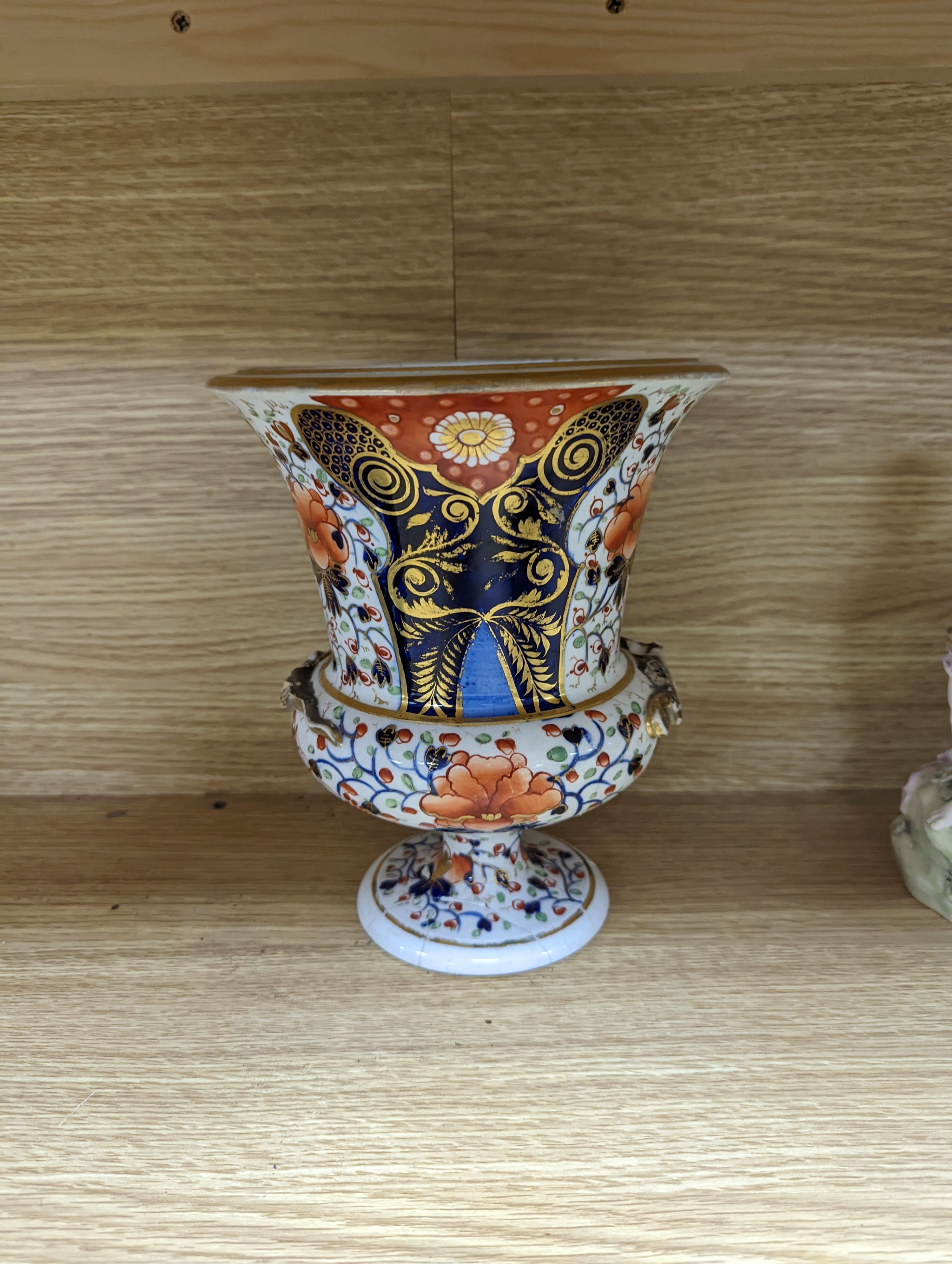 Two Chelsea Derby figure groups, three Derby Japan-pattern items to include an ice pail and two sucrier, together with a Copeland porcelain model of a tower
